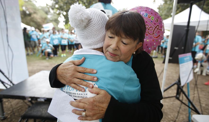 Participants prepare for the Cedars-Sinai Inaugural Run for Her Bay Area 5K run and Friendship Walk in Los Gatos, Calif., on Saturday, Sept. 20, 2014. (Tony Avelar/AP Images for Cedars-Sinai)