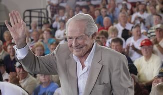 Evangelist Pat Robertson acknowledges the crowd before Republican presidential candidate Mitt Romney campaigns at the Military Aviation Museum in Virginia Beach, Va., Saturday, Sept. 8, 2012. (AP Photo/Charles Dharapak)