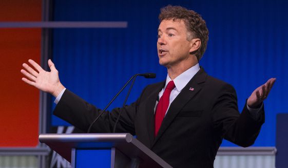 Republican presidential candidate Sen. Rand Paul, R-Ky., speaks during the first Republican presidential debate at the Quicken Loans Arena Thursday, Aug. 6, 2015, in Cleveland. (AP Photo/John Minchillo) ** FILE **