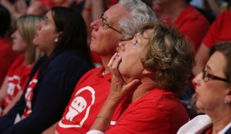 Onlookers watch debate in Cleveland arena.