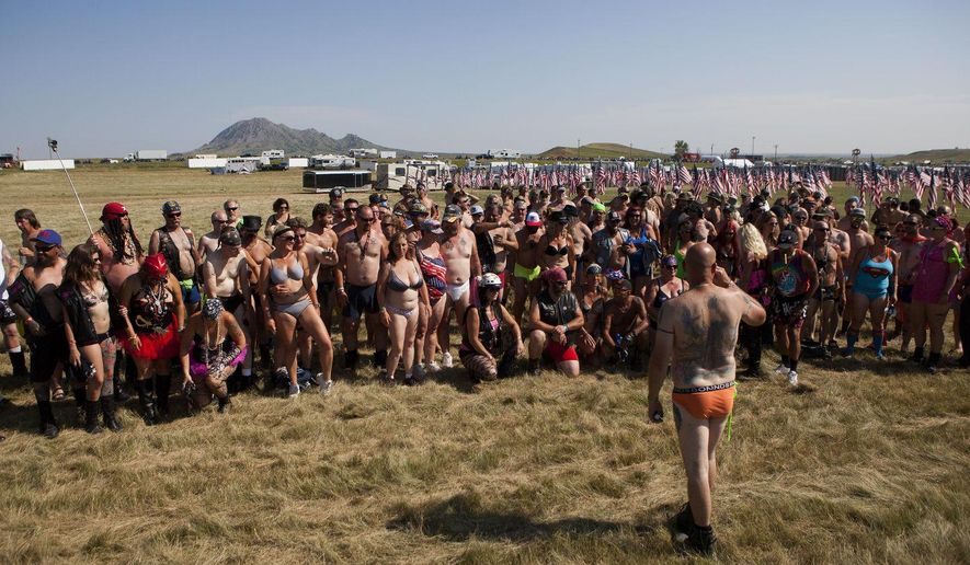 Participants in an attempt to break the world&#x27;s record for the largest congregation of people in only underwear gather for a group photo Wednesday, Aug. 5, 2015, at the Buffalo Chip Campground outside of Sturgis S.D. The attempt made Wednesday fell far short of the mark. Only 182 people gathered for a photo, well below the record of 2,270 people. (Josh Morgan/Rapid City Journal via AP) TV OUT; MANDATORY CREDIT