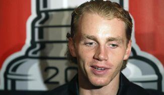 FILE - In this July 17, 2015, file photo, Chicago Blackhawks&#39; Patrick Kane speaks with reporters during the NHL hockey team&#39;s annual convention in Chicago. The NHL says it is &amp;quot;following developments&amp;quot; of a police investigation involving Chicago Blackhawks star Patrick Kane, Thursday, Aug. 6, 2015. (Daniel White/Daily Herald via AP, File) MANDATORY CREDIT; MAGS OUT