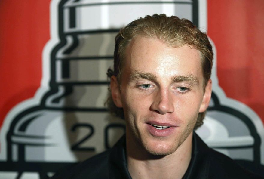 FILE - In this July 17, 2015, file photo, Chicago Blackhawks&#x27; Patrick Kane speaks with reporters during the NHL hockey team&#x27;s annual convention in Chicago. The NHL says it is &amp;quot;following developments&amp;quot; of a police investigation involving Chicago Blackhawks star Patrick Kane, Thursday, Aug. 6, 2015. (Daniel White/Daily Herald via AP, File) MANDATORY CREDIT; MAGS OUT