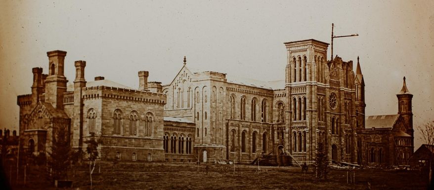 This photo provided by the Smithsonian Institution, is the earliest-known photo of the Smithsonian Castle in Washington, taken in 1850, during the Castle’s construction and is the earliest-known image of the building. The photo of the Smithsonian Castle, the Smithsonian’s first building, is going on display to celebrate the institution’s 169th birthday. The Smithsonian says the photo went on display in the great hall of the Castle on Monday, which coincides with the day in 1846 that President James K. Polk signed legislation creating the institution. (Smithsonian Institution via AP)