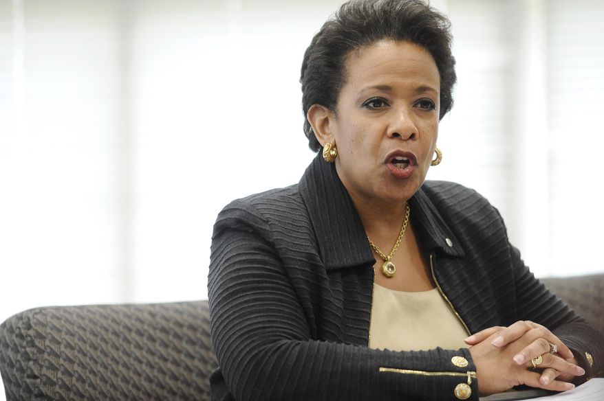 FILE - In this July 21, 2015 file photo, Attorney General Loretta Lynch speaks in East Haven, Conn. Lynch is voicing her support for police officers in a speech before the National Fraternal Order of Police. At a conference in Pittsburgh on Monday, Lynch thanked police for running toward danger and “working to maintain the peace.” (AP Photo/Jessica Hill, File)