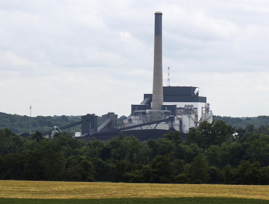 FILE - This July 15, 2015 file photo shows Alliant Energy's Interstate Power and Light's plant in Ottumwa, Iowa. Facing a new legal challenge, Alliant said in a legal filing Aug. 6, 2015 it will now allow net metering for rooftop power-generating systems financed by third-party solar companies, reversing a business practice that critics say improperly slowed the adoption of solar energy across the state. Customers will now be credited on their bills for excess energy they generate. (Matt Milner/The Courier via AP, File)