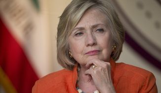 Hillary Rodham Clinton had initially said no classified information was sent or received on her server, though she has more recently clarified that only means no material that was officially marked as classified at the time. (Associated Press)