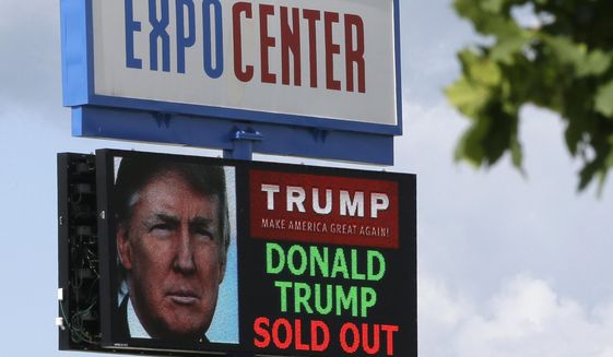The marquee for the Birch Run Expo Center shows a sold out Republican presidential candidate Donald Trump appearance, Tuesday, Aug. 11, 2015, in Birch Run, Mich. Trump is planning on attending the Lincoln Day Dinner of the Genesee and Saginaw county Republican parties. (AP Photo/Carlos Osorio)