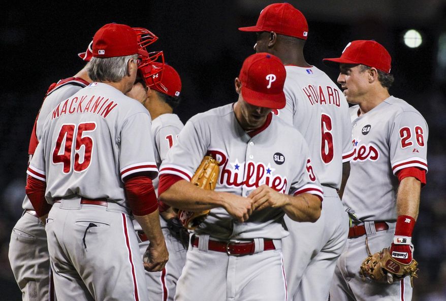 Philadelphia Phillies starting pitcher David Buchanan (55) is removed from the baseball game against the Arizona Diamondbacks during the second inning Tuesday, Aug. 11, 2015, in Phoenix. (Isaac Hale/The Arizona Republic via AP)