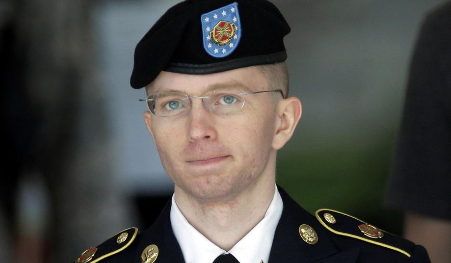 In this June 5, 2013, file photo Army Pvt. Chelsea Manning, then-Army Pfc. Bradley Manning, is escorted out of a courthouse in Fort Meade, Md., after the third day of her court martial. (AP Photo/Patrick Semansky, File)