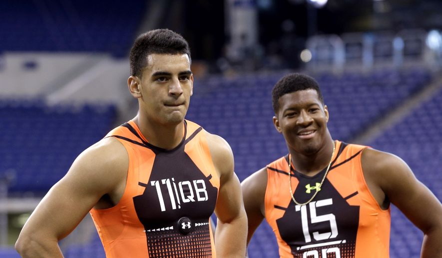 In this Feb. 21, 2015, file photo, then-Oregon quarterback Marcus Mariota (11) and then-Florida State quarterback Jameis Winston (15) wait to run a drill at the NFL football scouting combine in Indianapolis. It’s time for Winston and Mariota to show what they’ve been learning at training camp in their preseason debuts. (AP Photo/David J. Phillip, File) **FILE**