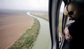 U.S. Customs and Border Protection Air and Marine agents patrol along the Rio Grande on the Texas-Mexico border. A report shows that immigration to the U.S. has recovered from its recession-caused lull and is surging back, led in part by a major jump in migrants from neighboring Mexico. (Associated Press)