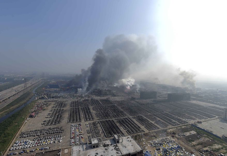 Huge explosions in the warehouse district of China&#39;s Tianjin municipality sent up massive fireballs that turned the night sky into day, officials and witnesses said. (Xinhua via AP)