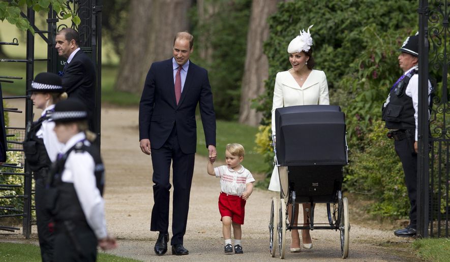 FILE- In this file photo dated Sunday, July 5, 2015, Britain&#39;s Prince William, Kate the Duchess of Cambridge, their son Prince George walk with their daughter Princess Charlotte in a pram, during an official media event as they arrive for Charlotte&#39;s Christening at St. Mary Magdalene Church in Sandringham, England.  Royal officials at Kensington Palace are urging all media organizations not to publish images of Prince George and Princess Charlotte, by some paparazzi photographers who are using increasingly dangerous tactics to snap images of the royals, which presents a risk “in a heightened security environment.’’ (AP Photo/Matt Dunham, FILE)
