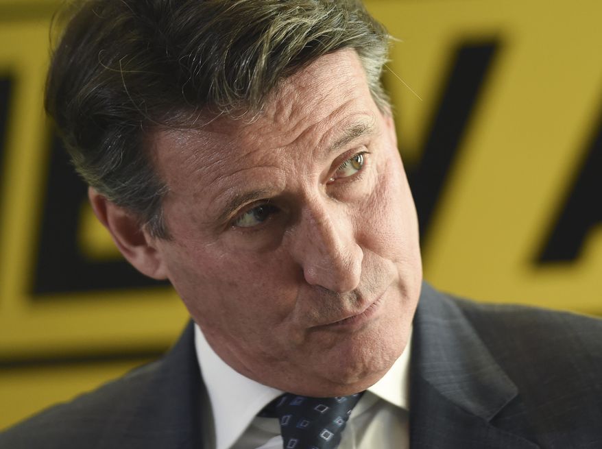 FILE - In this Dec. 3, 2014 file photo, former Olympic champion Sebastian Coe unveils his IAAF presidential campaign manifesto at the British Olympic Association in London, England. As the election campaign entered its final stages, Coe, a British former Conservative Party lawmaker and a member of the House of Lords, a two-time Olympic 1,500-meters champion and key figure in the team that won the right to host the 2012 Olympics and then organized the London Games, timed his kick for maximum effect with the kind of us-against-them statement designed to galvanize support in his run for the presidency of the track and field international governing body. (AP Photo/Tim Ireland, File)