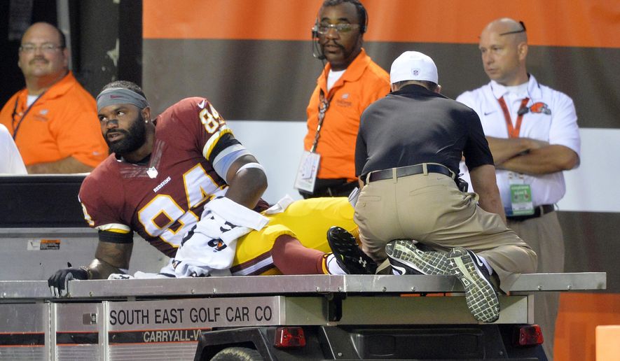 In this Aug. 13, 2015, photo, Washington Redskins tight end Niles Paul leaves on a cart during the first quarter after an injury during an NFL preseason football game against the Cleveland Browns in Cleveland.  At this point, Jordan Reed, whose biggest flaw so far has been an inability to stay on the field, is the healthiest experienced tight end the Washington Redskins have, and even he&#39;s dealing with a bad hamstring. (AP Photo/David Richard)
