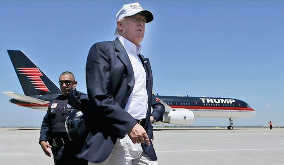 Donald Trump shown here in Laredo, Texas before a tour of the Texas/Mexico border. He outlined his views on the U.S.-Mexico border Sunday. Mr. Trump leads the GOP presidential pack, with 25 percent support. (Associated Press)