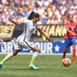 United States forward Christen Press (23) beats Costa Rica midfielder Cristin Granados (15) to score a goal during the first half of a women&#x27;s friendly soccer match on Sunday, Aug. 16, 2015, in Pittsburgh. (AP Photo/Don Wright)