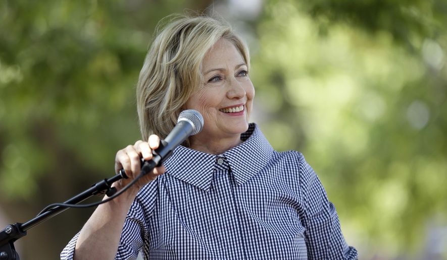 Democratic presidential candidate Hillary Rodham Clinton speaks during a news conference during a visit to the Iowa State Fair, Saturday, Aug. 15, 2015, in Des Moines, Iowa. (AP Photo/Charlie Neibergall)
