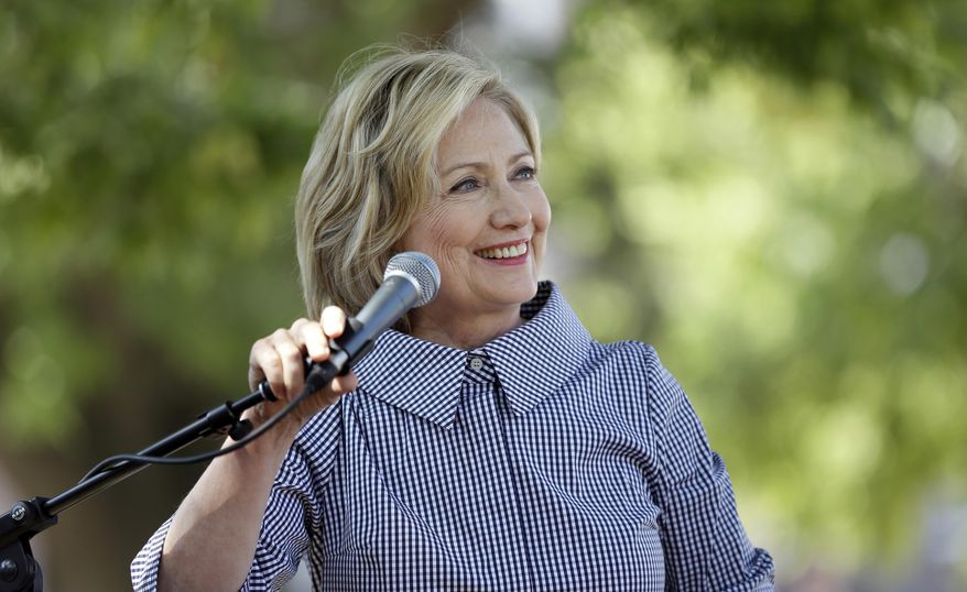 Democratic presidential candidate Hillary Rodham Clinton speaks during a news conference during a visit to the Iowa State Fair, Saturday, Aug. 15, 2015, in Des Moines, Iowa. (AP Photo/Charlie Neibergall)