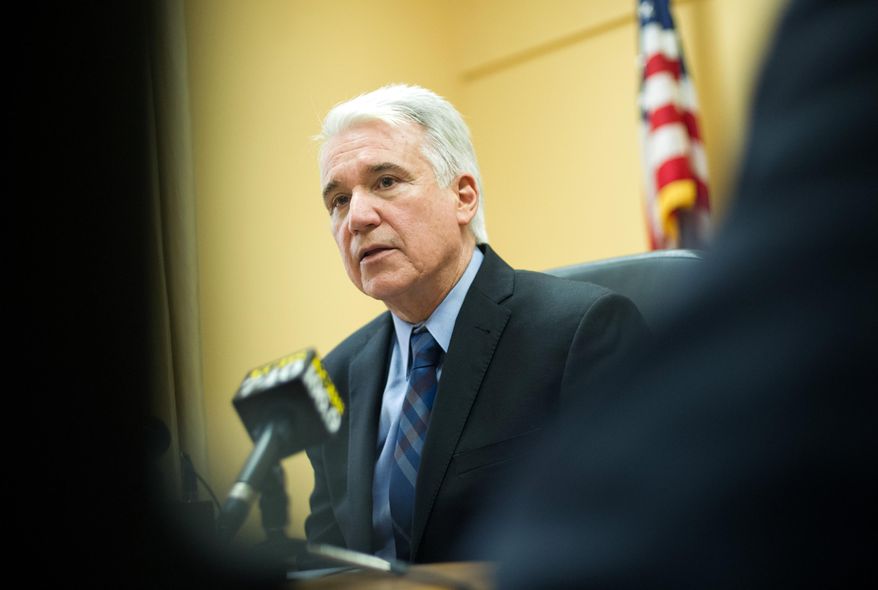 San Francisco District Attorney George Gascon speaks during a news conference at the Hall of Justice in San Francisco on Wednesday, Aug. 19, 2015. The district attorney's office announced that it is expanding a consumer-protection lawsuit aimed at ridesharing company Uber's claims about driver background checks. (AP Photo/Josh Edelson)