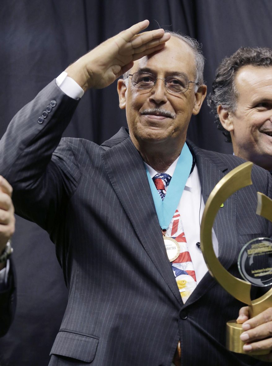 In this Sunday, Sept. 21, 2014, photo, retired Army Lt. Gen. Russel Honore, who served as commander of Joint Task Force Katrina, salutes as he receives the People&#39;s Choice award in the first half of an NFL football game between the New Orleans Saints and the Minnesota Vikings in New Orleans. (AP Photo/Bill Haber) **FILE**