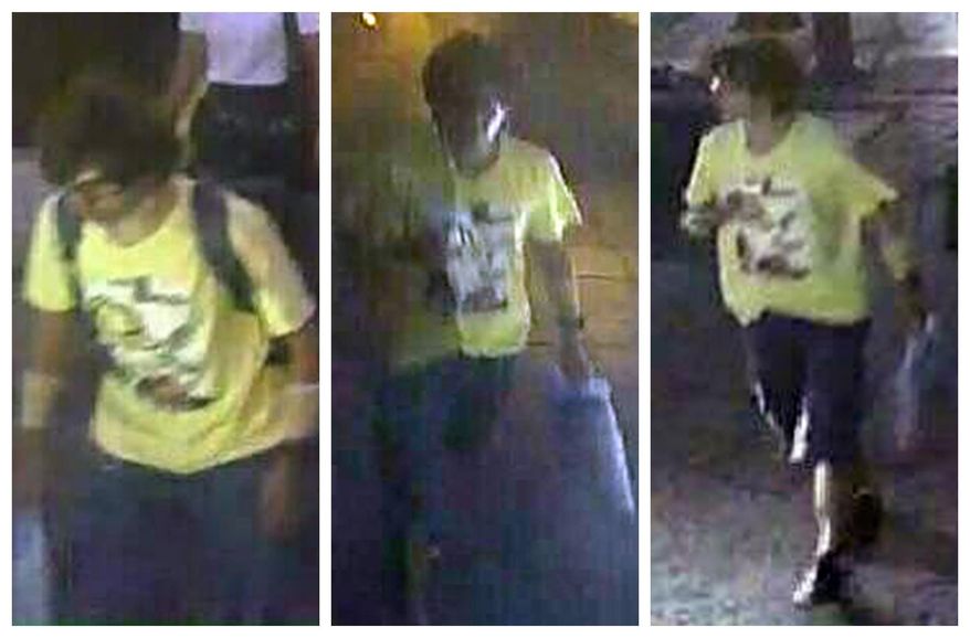 This Aug. 17, 2015, image, released by Royal Thai Police spokesman Lt. Gen. Prawut Thavornsiri shows a man wearing a yellow T-shirt near the Erawan Shrine before an explosion occurred in Bangkok, Thailand. Prawut said he believes the man is a suspect in the blast that killed a number of people at a shrine in downtown Bangkok on Monday night. (Royal Thai Police via AP)
