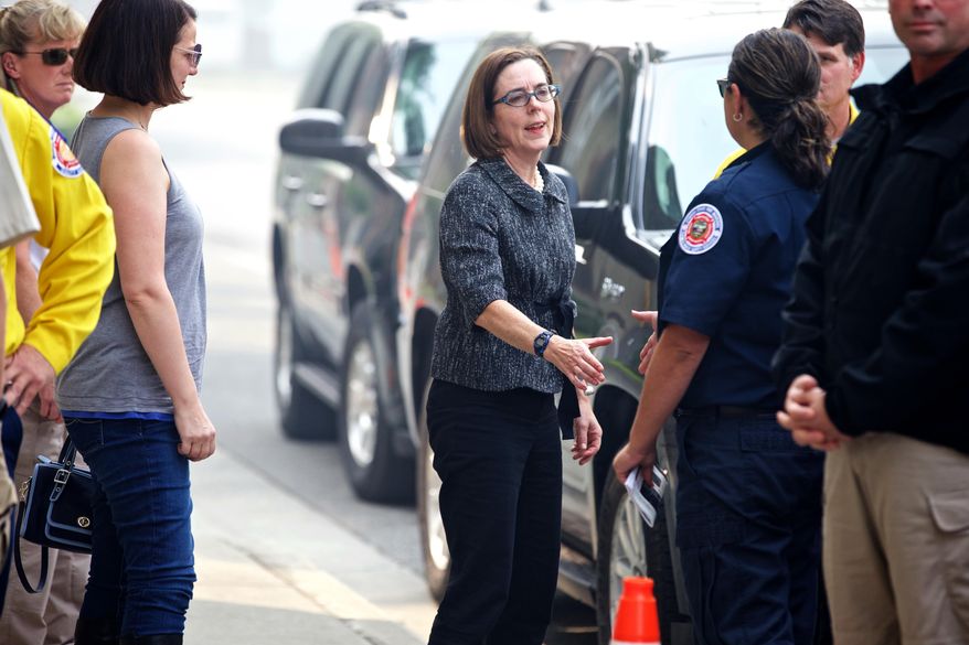 Gov. Kate Brown meets with homeowners in Canyon City, Ore., who lost their homes to the Canyon Creek Complex fire, Wednesday, Aug. 19, 2015, near John Day, Ore. (Thomas Boyd /The Oregonian via AP) MAGS OUT; TV OUT; NO LOCAL INTERNET; THE MERCURY OUT; WILLAMETTE WEEK OUT; PAMPLIN MEDIA GROUP OUT; MANDATORY CREDIT