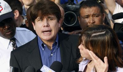 In this March 14, 2012 file photo, former Illinois Gov. Rod Blagojevich speaks to the media outside his home in Chicago as his wife, Patti, wipes away tears a day before he was to report to a prison in Littleton, Colo. On Wednesday, Aug. 19, 2015, the 7th U.S. Circuit Court of Appeals in Chicago posted a notice indicating there would be no rehearing for the imprisoned Democrat on his corruption convictions. (AP Photo/M. Spencer Green, File)