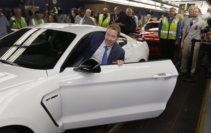 Ford Motor Co., Executive Chairman Bill Ford enters the 2015 Ford Shelby GT350R on the assembly line the Flat Rock Assembly Plant, Thursday, Aug. 20, 2015, in Flat Rock, Mich. Ford plans on building 37 GT350R and 100 GT350 vehicles on the same assembly line that produces the Mustang and Ford Fusion. (AP Photo/Carlos Osorio)