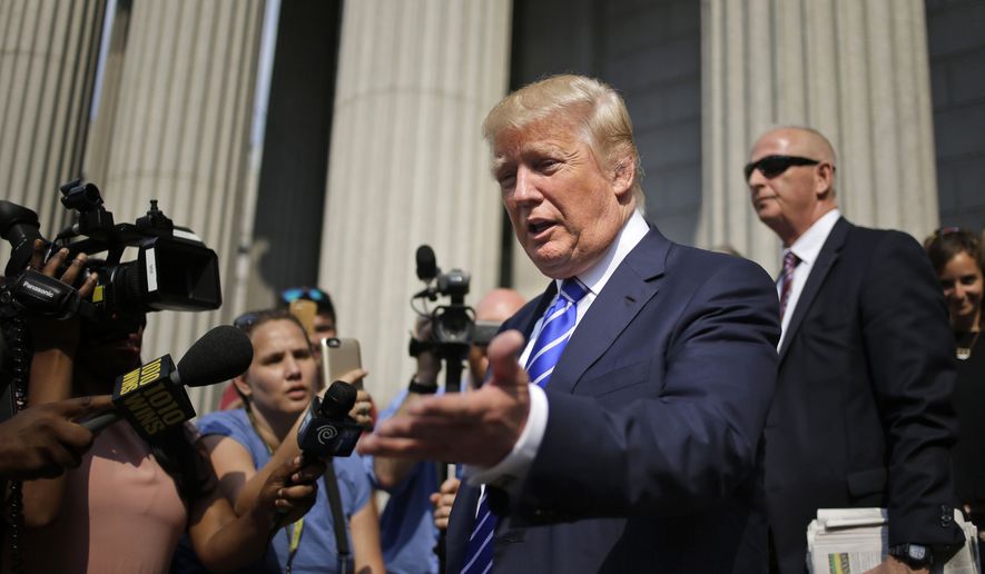 Republican presidential candidate Donald Trump leaves the courthouse after serving on jury duty in New York, Monday, Aug. 17, 2015. The Republican presidential candidate reported for jury duty in Manhattan on Monday and spent much of the day like everyone else, filling out forms and wondering whether he would get picked. (AP Photo/Seth Wenig)