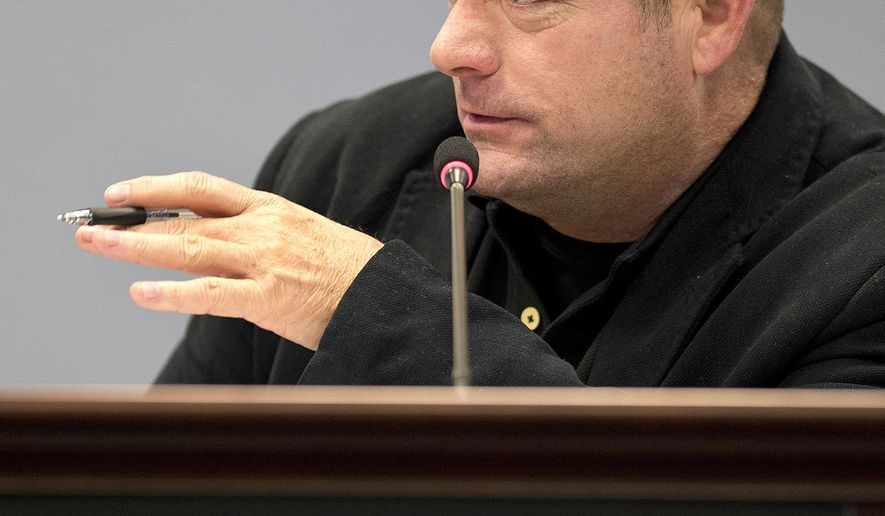 FILE - In this Tuesday, Jan. 6, 2015, file photo, Frederick County Councilman Kirby Delauter speaks during a meeting of the recently formed 7-member council, at Winchester Hall in Frederick, Md. Delauter is protesting the tightening of ethics rules by saying his business will cease making charitable contributions. The Frederick News-Post reports that Republican Delauter posted a Facebook message Wednesday, Aug. 19, 2015, urging one of his favorite charities to seek contributions instead from those who voted for the tougher regulations. (Bill Green/The Frederick News-Post via AP) MANDATORY CREDIT