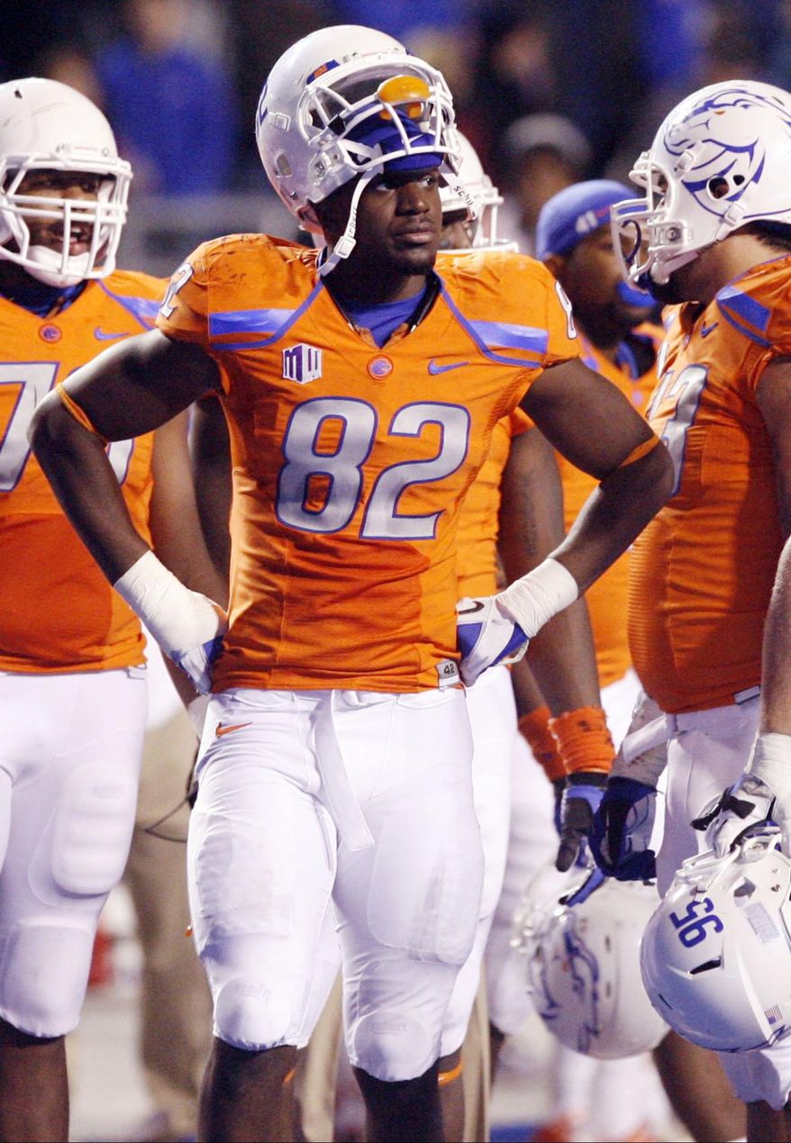 In this Nov. 2012, photo, then-Boise State NCAA college football player Samuel Ukwuachu (82) watches from the sidelines during an official review of a San Diego State touchdown at Bronco Stadium in Boise, Id. A one-time All-American who transferred to play football at Baylor University has been convicted of sexually assaulting a fellow student athlete in 2013. A jury in Texas district court found 22-year-old Sam Ukwuachu guilty Thursday, Aug. 20, 2015, of one count of sexual assault. ( Joe Jaszewski/Idaho Statesman via AP) LOCAL TELEVISION OUT (KTVB 7); MANDATORY CREDIT