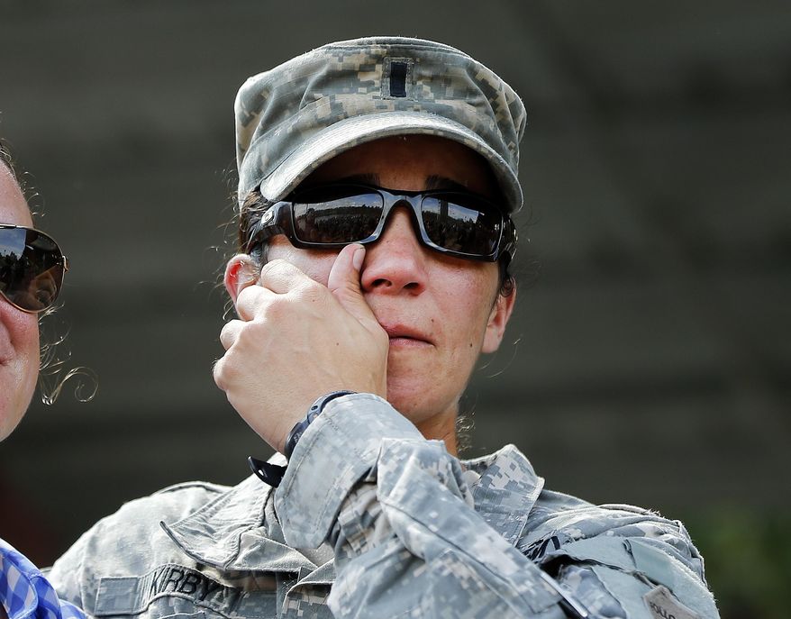 U.S. Army First Lt. Alessandra Kirby wipes away a tear after a Ranger School graduation ceremony, Friday, Aug. 21, 2015, at Fort Benning, Ga. First Lt. Shaye Haver and Capt. Kristen Griest became the first female soldiers to complete the course and receive their Ranger tabs. (AP Photo/John Bazemore)