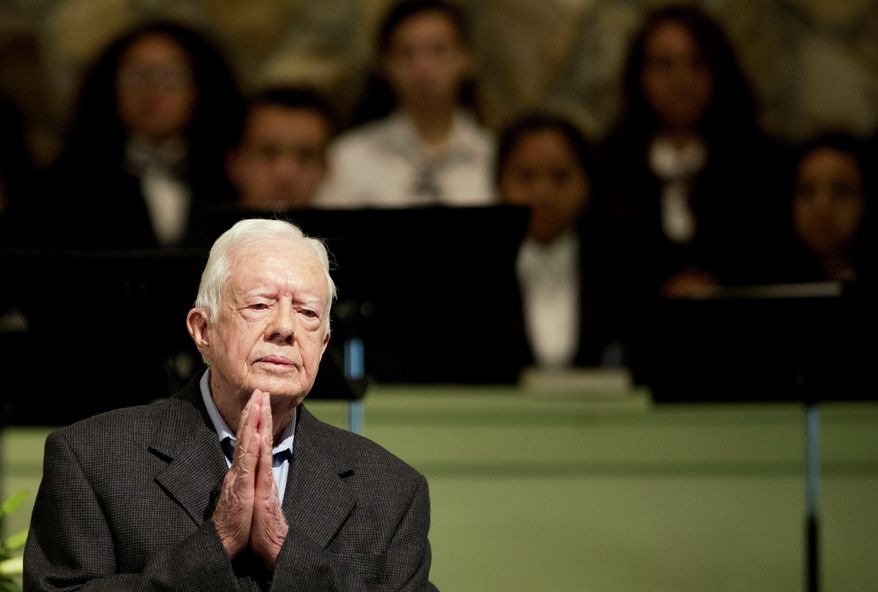 Former President Jimmy Carter teaches Sunday School class at Maranatha Baptist Church in his hometown Sunday, Aug. 23, 2015, in Plains, Ga. The 90-year-old Carter gave one lesson to about 300 people filling the small Baptist church that he and his wife, Rosalynn, attend. It was Carter&#39;s first lesson since detailing the intravenous drug doses and radiation treatment planned to treat melanoma found in his brain after surgery to remove a tumor from his liver. (AP Photo/David Goldman)