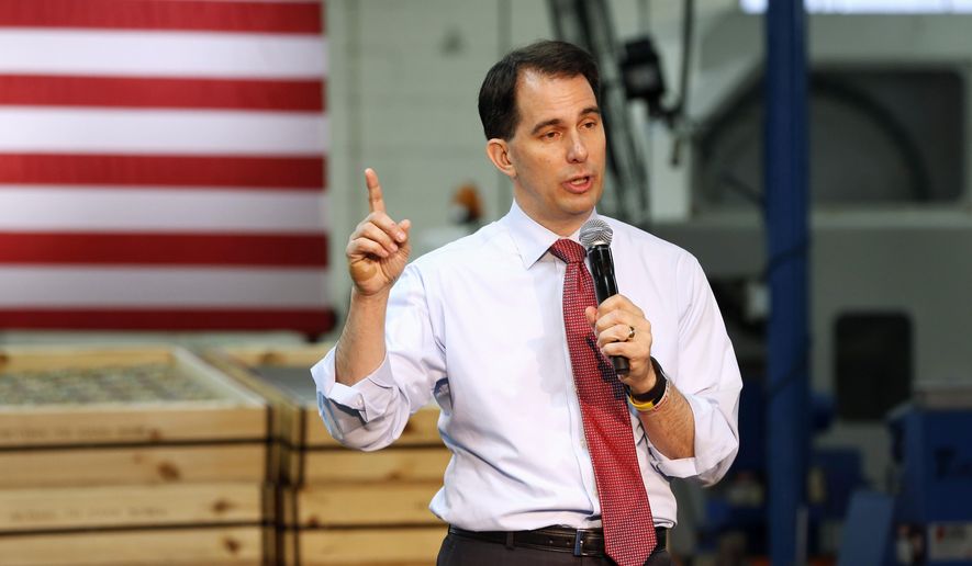 In this Aug. 18, 2015, file photo, Republican presidential candidate, Wisconsin Gov. Scott Walker, speaks in Brooklyn Center, Minn., where he presented his plan to replacing President Barack Obama&#x27;s health care law. (AP Photo/Jim Mone, File)