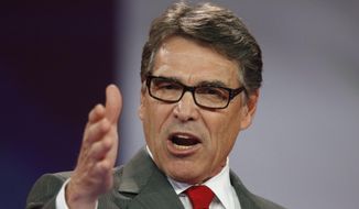 Republican presidential candidate and former Texas Gov. Rick Perry speaks at the Defending the American Dream summit hosted by Americans for Prosperity at the Greater Columbus Convention Center in Columbus, Ohio, on Aug. 22, 2015. (Associated Press) **FILE**