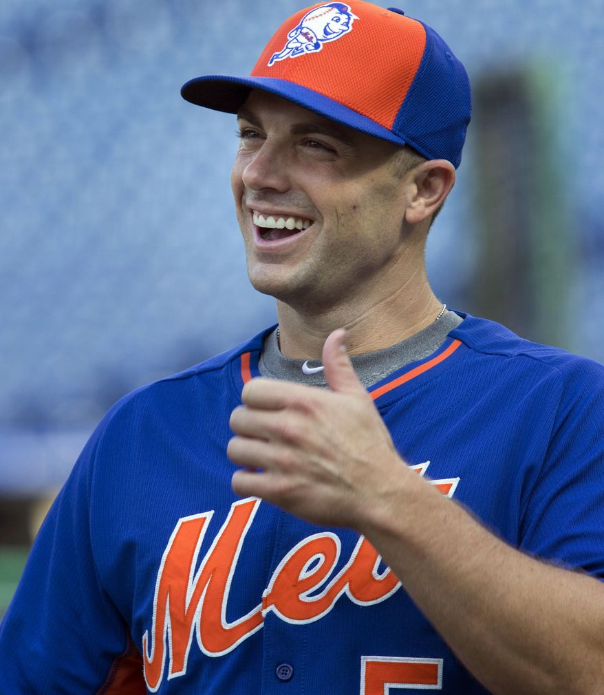 New York Mets third baseman David Wright laughs during warmups before the start of a baseball game with the Philadelphia Phillies, Monday, Aug. 24, 2015, in Philadelphia. (AP Photo/Laurence Kesterson)