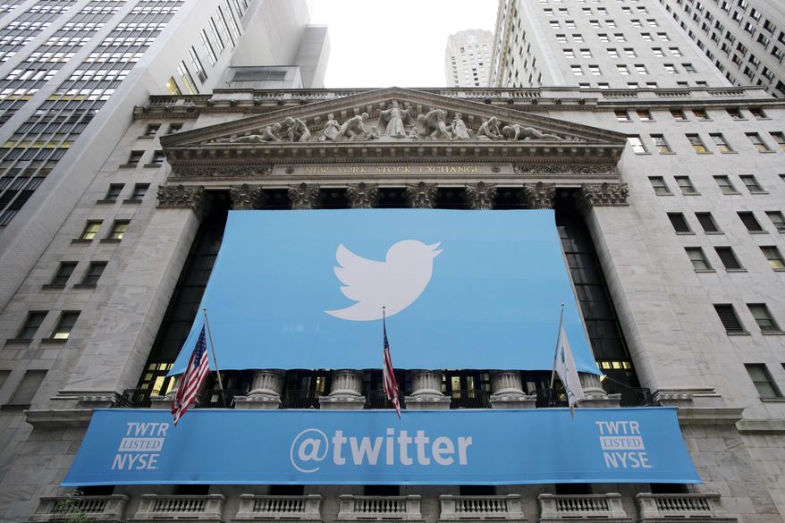 In this Thursday, Nov. 7, 2013, file photo, a banner with the Twitter logo hangs on the facade of the New York Stock Exchange in New York the day after the company went public. (AP Photo/Mark Lennihan, File) ** FILE ** 
