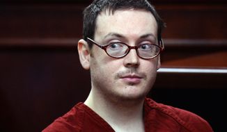 James Holmes appears in court for the sentencing phase in his trial, Monday, Aug. 24, 2015, at Arapahoe County District Court in Centennial, Colo. Victims and their families were given the opportunity to speak about the shooting and its effects on their lives. (RJ Sangosti/The Denver Post via AP, Pool)