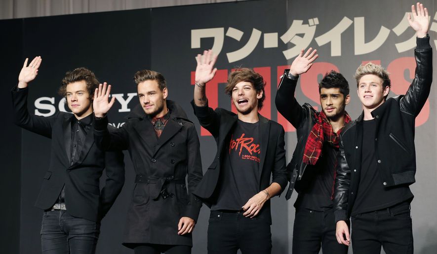 FILE- In this March 25, 2015 file photo, members of One Direction, from left, Harry Styles, Liam Payne, Louis Tomlinson, Zayn Malik and Niall Horan, wave during an event to promote their film "One Direction: This Is US," in Makuhari, near Tokyo. A British newspaper has reported Monday, Aug. 24, 2015, the band members would go separate ways after finishing a tour this autumn and promoting their fifth album. Publicist Simon Jones says he won’t comment on “speculation” that the group will take a hiatus starting in March. (AP Photo/Koji Sasahara, File)