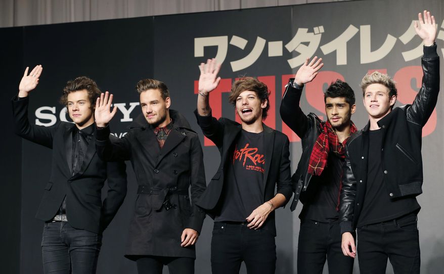 FILE- In this March 25, 2015 file photo, members of One Direction, from left, Harry Styles, Liam Payne, Louis Tomlinson, Zayn Malik and Niall Horan, wave during an event to promote their film "One Direction: This Is US," in Makuhari, near Tokyo. A British newspaper has reported Monday, Aug. 24, 2015, the band members would go separate ways after finishing a tour this autumn and promoting their fifth album. Publicist Simon Jones says he won’t comment on “speculation” that the group will take a hiatus starting in March. (AP Photo/Koji Sasahara, File)