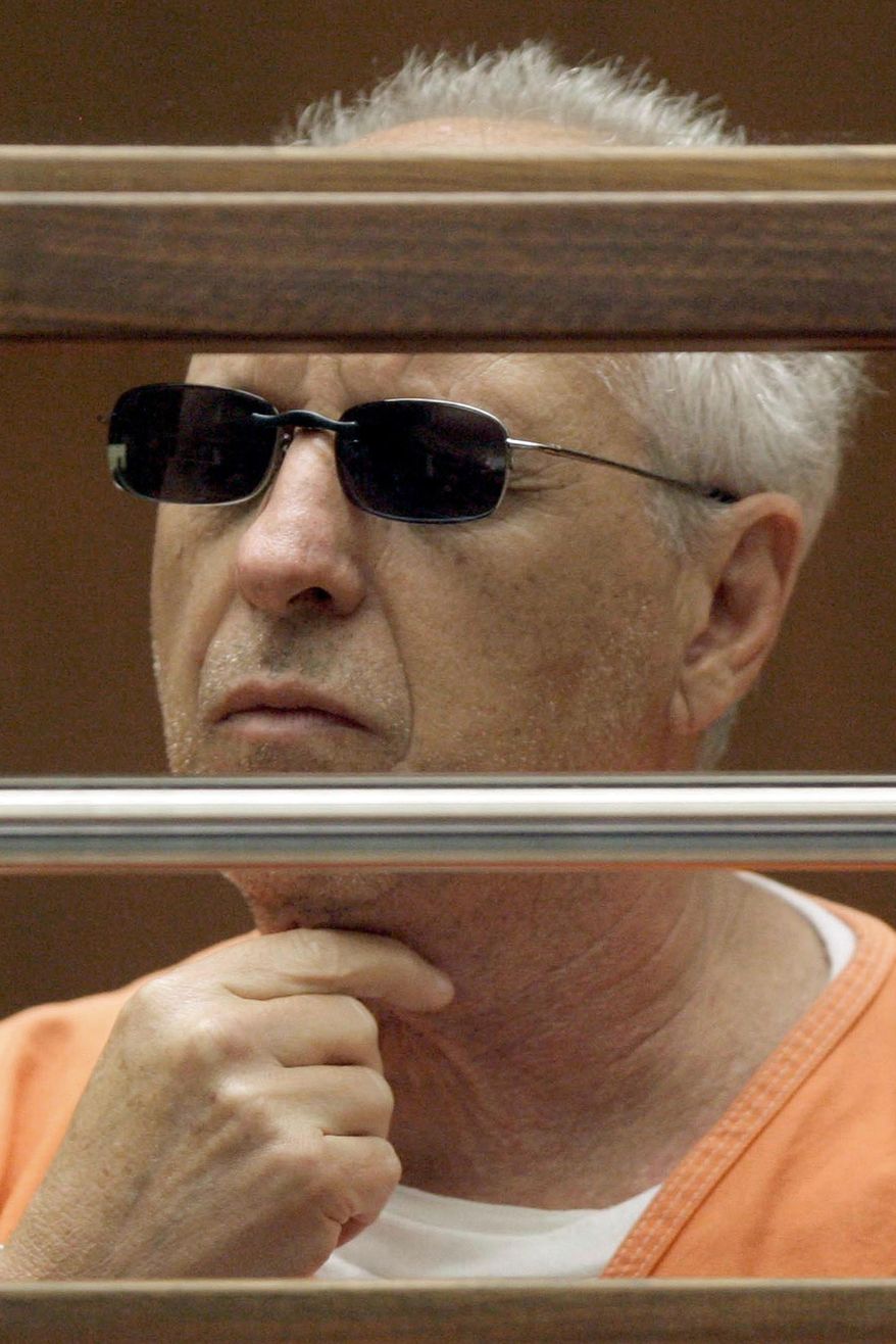FILE - In this June 19, 2009 file photo, former Hollywood private eye Anthony Pellicano appears in court in Los Angeles. A racketeering conviction of the private eye who wiretapped phones for rich and famous clients to dig up dirt on rivals, ex-lovers and celebrities was upheld Tuesday, Aug. 25, 2015, by a federal appeals court, though the panel tossed out a few counts against him and co-conspirators. The 9th U.S. Circuit Court of Appeals said Pellicano and his cohorts participated in a "widespread criminal enterprise" that bribed police for confidential information, paid a phone company technician to tap lines and hired a software developer to create the "Telesleuth" program that recorded conversations. (AP Photo/Nick Ut, File)