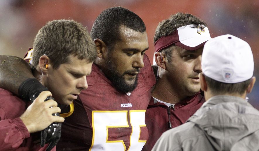 Washington Redskins inside linebacker Adam Hayward (55) leaves the field with an injury during the first half of an NFL preseason football game against the Detroit Lions in Landover, Md., Thursday, Aug. 20, 2015. (AP Photo/Mark Tenally)