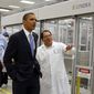 President Obama is given a tour of Solyndra by Executive Vice President Ben Bierman (right) as Chief Executive Officer Chris Gronet walks along at Solyndra Inc. in Fremont, Calif., on May 26, 2010. (Associated Press)