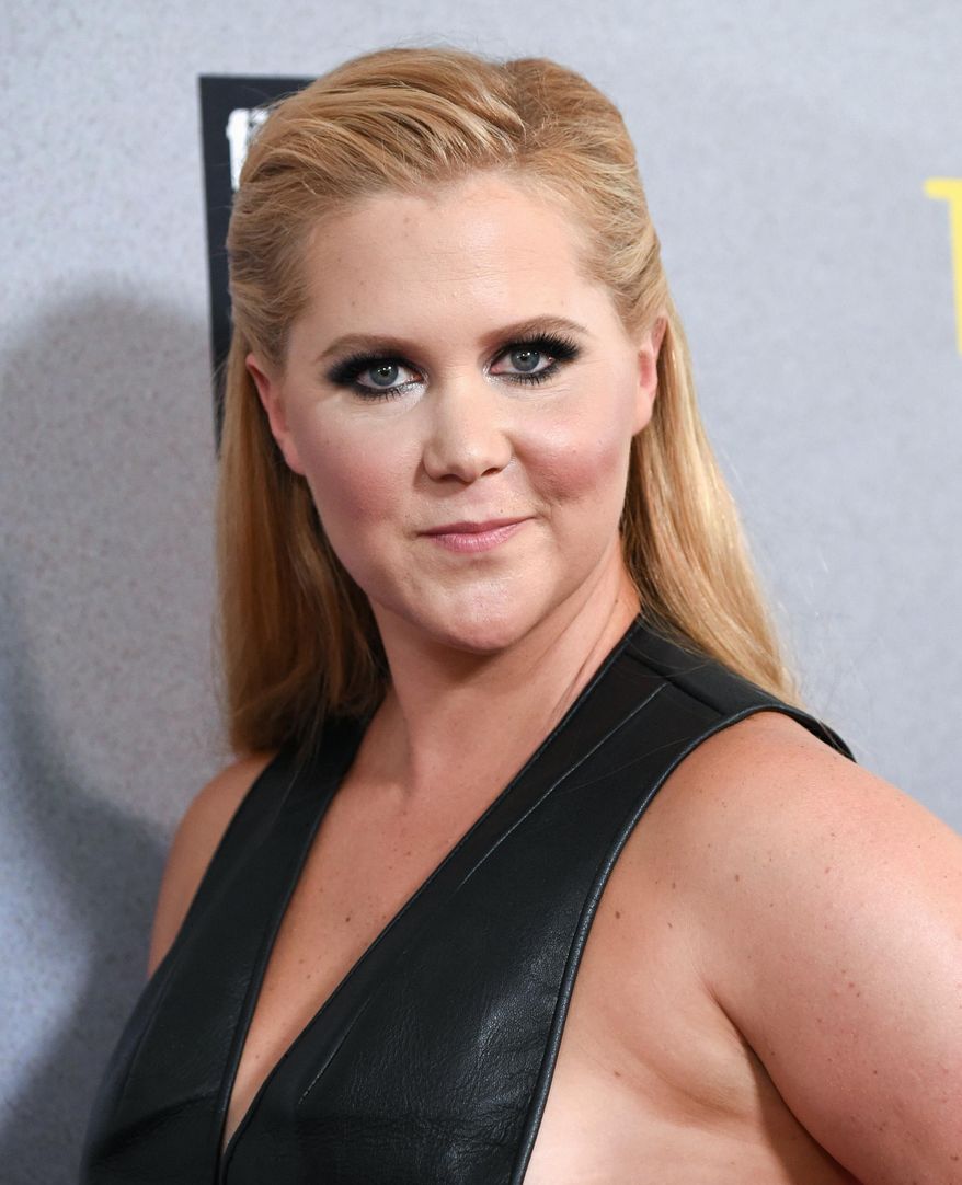 FILE - In this July 14, 2015 file photo, actress Amy Schumer attends the world premiere of "Trainwreck"in New York. A representative for Jennifer Lawrence confirmed Wednesday, Aug. 26, that Lawrence and Schumer are writing a screenplay. In an interview with The New York Times, Lawrence said that the two are planning to star in the comedy as sisters. (Photo by Evan Agostini/Invision/AP, File)