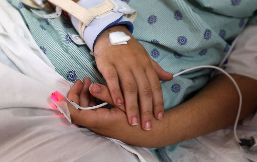 ADVANCE FOR SUNDAY AUG. 30 - In this Thursday, Aug. 13, 2015 photo, Hope DeHart, 18, who was shot in the head and left for dead on a road in north Fort Worth and is making a miraculous recovery at JPS Hospital in Fort Worth, Texas. (Joyce Marshall/Star-Telegram via AP) MAGS OUT; (FORT WORTH WEEKLY, 360 WEST); INTERNET OUT; MANDATORY CREDIT