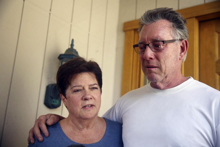 FILE - In this Thursday, July 2, 2015 file photo, Liz Sullivan, left, and Jim Steinle, right, parents of Kathryn Steinle, talk to members of the media outside their home in Pleasanton, Calif. Prosecutors have charged Mexican immigrant Francisco Sanchez with murder in the waterfront shooting death of Steinle. Competing versions of the same event emerged Wednesday, Aug. 26, 2015, during the second day of the preliminary hearing held to determine if there's enough evidence for Lopez-Sanchez to stand trial on murder charges. (Lea Suzuki/San Francisco Chronicle via AP, File)
