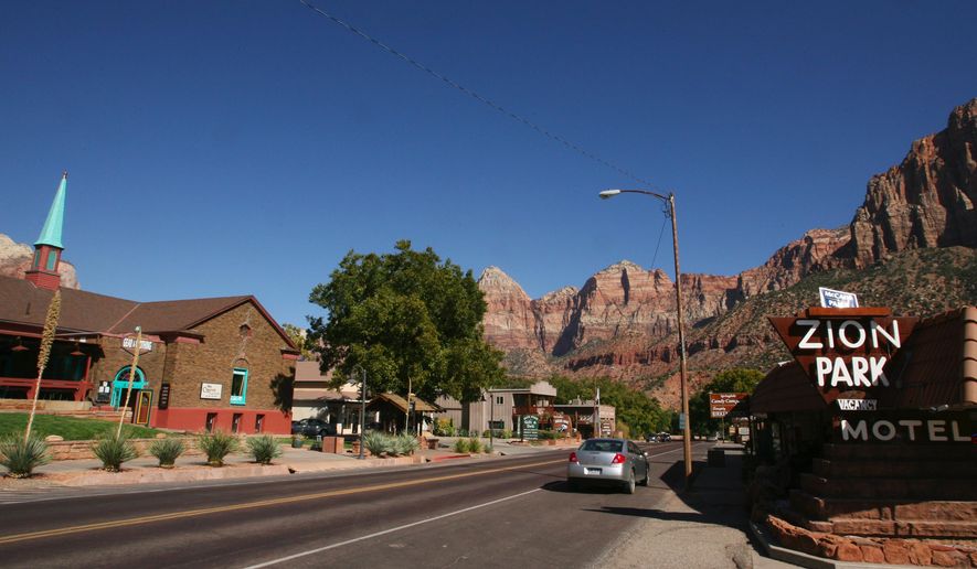 In this Oct. 23, 2008 photo, State Route 9 runs through downtown Springdale, Springdale, a small Utah town outside Zion National Park has repealed a ban on chain restaurants after about a decade of legal battles, clearing the way for one of the country’s biggest fast food chains to open in Springdale amid the village’s mom-and-pop restaurants and cafes. (Jud Burkett/The Spectrum via AP) NO SALES; MANDATORY CREDIT