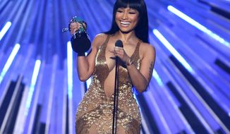 Nicki Minaj accepts the award for hip-hop video of the year for “Anaconda” at the MTV Video Music Awards at the Microsoft Theater on Sunday, Aug. 30, 2015, in Los Angeles. (Photo by Matt Sayles/Invision/AP)